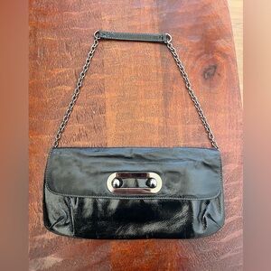 Hobo International black patent leather
Alicia clutch bag gunmetal-tone hardware